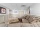 Comfortable living room with soft sectional sofa, stylish area rug, and framed sports memorabilia at 65 Gatewood Dr, Marietta, GA 30068