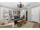 Comfortable living room with hardwood floors and plantation shutters with an open concept layout at 65 Gatewood Dr, Marietta, GA 30068