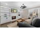 Inviting living room with built-in shelves, fireplace, and a comfortable seating area at 65 Gatewood Dr, Marietta, GA 30068