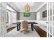 Stylish office with wainscoting, bay window, hardwood floors, and a modern chandelier at 65 Gatewood Dr, Marietta, GA 30068