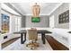 Office with wainscoting, bay window, hardwood floors, and a contemporary light fixture at 65 Gatewood Dr, Marietta, GA 30068
