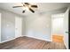 Bedroom showcasing neutral walls, hardwood flooring, and natural light at 220 Timber Ln, Stockbridge, GA 30281