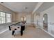 Basement area features a billiards table, light carpeting, and a vintage design at 2382 Merrymount Dr, Suwanee, GA 30024