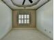 Neutral bedroom with a ceiling fan and a window providing natural light at 2382 Merrymount Dr, Suwanee, GA 30024