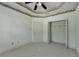 Neutral bedroom with a ceiling fan, a closet and a window at 2382 Merrymount Dr, Suwanee, GA 30024