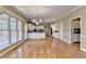 Bright eat-in kitchen featuring hardwood floors and large windows for ample natural light at 2382 Merrymount Dr, Suwanee, GA 30024