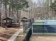 Community pickleball and picnic area surrounded by trees at 2382 Merrymount Dr, Suwanee, GA 30024