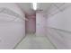 Spacious walk-in closet with shelving for ample storage at 2382 Merrymount Dr, Suwanee, GA 30024