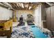 Finished basement featuring a foosball table, exercise equipment, and blue rug at 3176 Crestmont Nw Way, Kennesaw, GA 30152