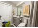Bathroom featuring neutral colors, shower, toilet, vanity, and doorway at 3176 Crestmont Nw Way, Kennesaw, GA 30152