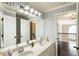 Spacious bathroom with double sinks and a view into the upper floor at 3176 Crestmont Nw Way, Kennesaw, GA 30152