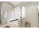 Modern bathroom featuring a soaking tub and a separate enclosed shower with a neutral color palette at 3176 Crestmont Nw Way, Kennesaw, GA 30152