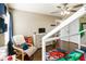 Spiderman-themed bedroom featuring hardwood floors, a ceiling fan, and plenty of natural light at 3176 Crestmont Nw Way, Kennesaw, GA 30152