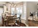 Cozy breakfast nook with a round wooden table and natural light at 3176 Crestmont Nw Way, Kennesaw, GA 30152