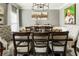 Dining room features dark wood table, seating for six, and artwork on the wall at 3176 Crestmont Nw Way, Kennesaw, GA 30152