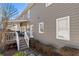 Exterior of home with covered deck, stairs leading to the yard, and neutral siding at 3176 Crestmont Nw Way, Kennesaw, GA 30152
