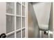 Hallway with decorative glass door and staircase at 3176 Crestmont Nw Way, Kennesaw, GA 30152