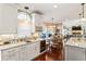 Charming kitchen with wine rack, and seamless flow into the breakfast nook and living area at 3176 Crestmont Nw Way, Kennesaw, GA 30152