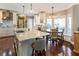 Beautiful kitchen with white cabinetry, granite countertops, stainless appliances, and a breakfast nook at 3176 Crestmont Nw Way, Kennesaw, GA 30152