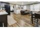 Cozy living room with a sectional sofa, dining table and small kitchen at 3176 Crestmont Nw Way, Kennesaw, GA 30152