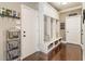 Hallway with built in storage cubbies, and a bench with storage baskets at 3176 Crestmont Nw Way, Kennesaw, GA 30152