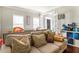 Playroom with sofa, hardwood floors, windows, and a 'READ' sign on the wall at 3176 Crestmont Nw Way, Kennesaw, GA 30152