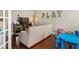 Playroom with hardwood floors, sofa, blue table, and a 'PLAY' sign on the wall at 3176 Crestmont Nw Way, Kennesaw, GA 30152