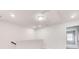 Hallway and staircase with natural light at 5652 Plain Field Ln, Lilburn, GA 30047