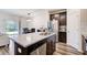 Spacious kitchen island with stainless steel appliances and ample countertop space at 5652 Plain Field Ln, Lilburn, GA 30047