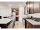 Gourmet kitchen featuring stainless steel appliances and granite countertops at 5652 Plain Field Ln, Lilburn, GA 30047