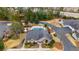 Aerial view of a well-maintained community pool with lounge chairs and manicured landscaping at 10104 Windrush Ln, Alpharetta, GA 30009