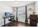 Home office with hardwood floors, shelving, window and standing desk at 10475 Willow Meadow Cir, Alpharetta, GA 30022