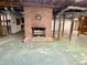 Unfinished basement with exposed ducts and a vintage brick fireplace at 6787 Hembree Dr, Austell, GA 30168