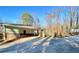 Spacious carport area, providing covered parking and protection from the elements at 6787 Hembree Dr, Austell, GA 30168