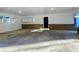 Bright, spacious carport with ample room for parking, offering extra storage with built in shelving at 6787 Hembree Dr, Austell, GA 30168