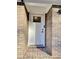 Close-up of the front door surrounded by brickwork at 6787 Hembree Dr, Austell, GA 30168