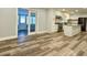 Open concept kitchen with stainless steel appliances, granite counters, and an island at 6787 Hembree Dr, Austell, GA 30168