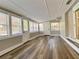 Bright sunroom with large windows offering lots of natural light at 6787 Hembree Dr, Austell, GA 30168