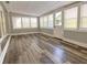 Bright sunroom with large windows offering lots of natural light at 6787 Hembree Dr, Austell, GA 30168