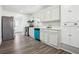 Modern kitchen with stainless steel appliances, white cabinets, and stylish backsplash at 1189 Kathryn Cir, Forest Park, GA 30297