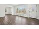 Bright living room featuring wood floors, fresh paint, and lots of natural light at 1189 Kathryn Cir, Forest Park, GA 30297