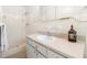 Clean bathroom features a shower and vanity with a decorative accent at 1331 Woodhill Dr, Marietta, GA 30066