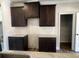 Kitchen details showcase granite counters, dark cabinets, subway tile backsplash, and a pantry at 4371 Portsbrook Ave, Snellville, GA 30039