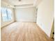 Bright bedroom featuring a tray ceiling and large windows at 4524 Mystic Dr, Sandy Springs, GA 30327