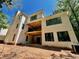 Modern two-story home exterior with large windows and a walkout basement at 4524 Mystic Dr, Sandy Springs, GA 30327