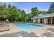 Enjoy a refreshing swim in the community pool, complete with lounge chairs, umbrellas, and a pool house at 1555 Mosaic Way # 1555, Smyrna, GA 30080