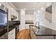Stylish kitchen showcasing granite countertops, stainless steel appliances, and hardwood flooring at 1555 Mosaic Way # 1555, Smyrna, GA 30080