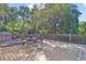 Large back deck with seating overlooks the beautiful wooded yard at 265 Haas Se Ave, Atlanta, GA 30316