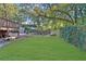 Lush backyard with a shed, equipment, and plenty of open space for recreation at 265 Haas Se Ave, Atlanta, GA 30316