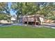 Large, well-maintained backyard with deck, shed, and green grass for activities and recreation at 265 Haas Se Ave, Atlanta, GA 30316